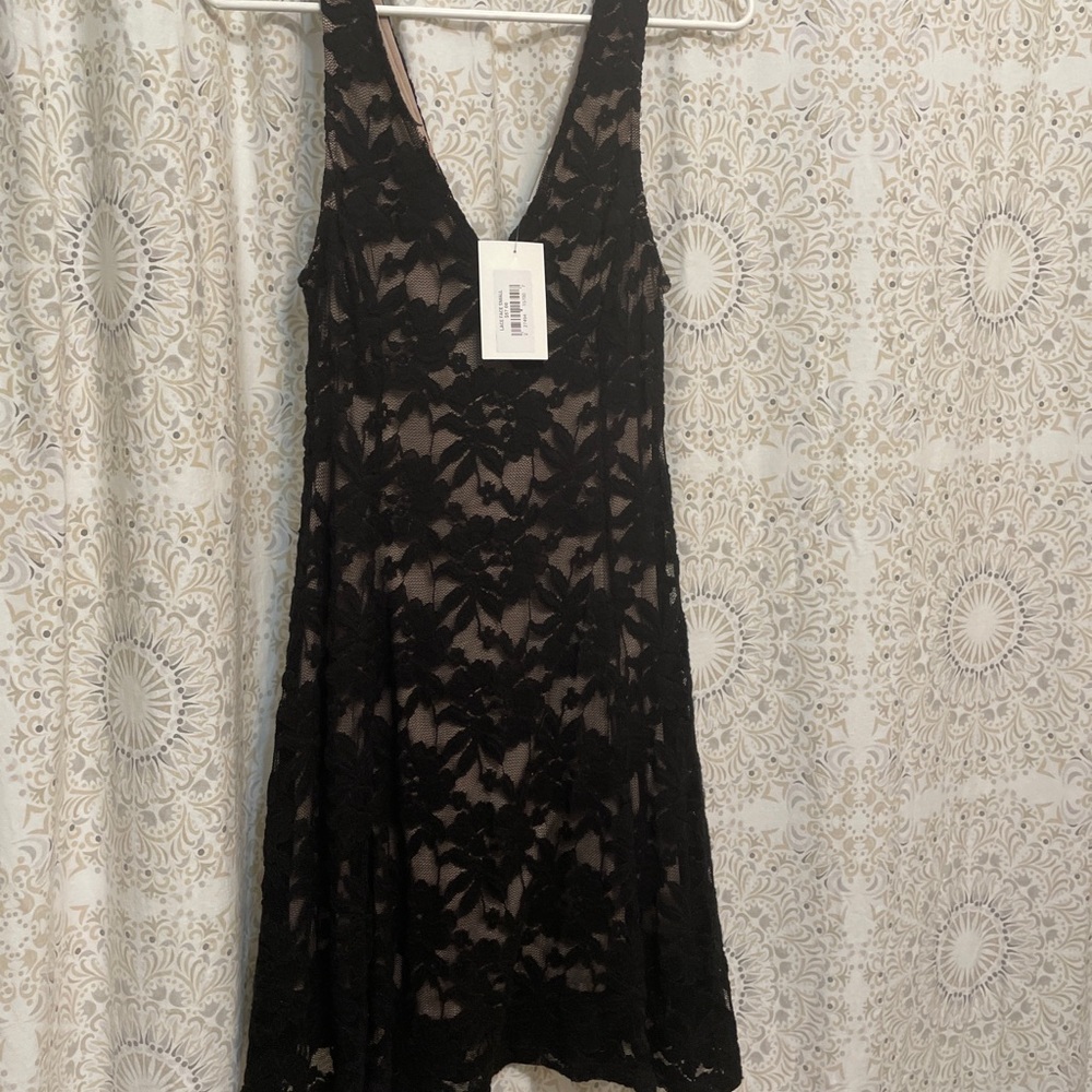 Small Black lace boutique dress- new with tags
